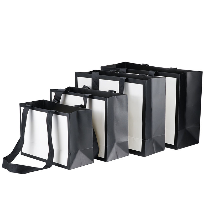 Waterproof Eco Friendly Foldable Cheap lamination Bulk Shopping Paper Bag with Ribbon Handles Manufacturer Wholesale